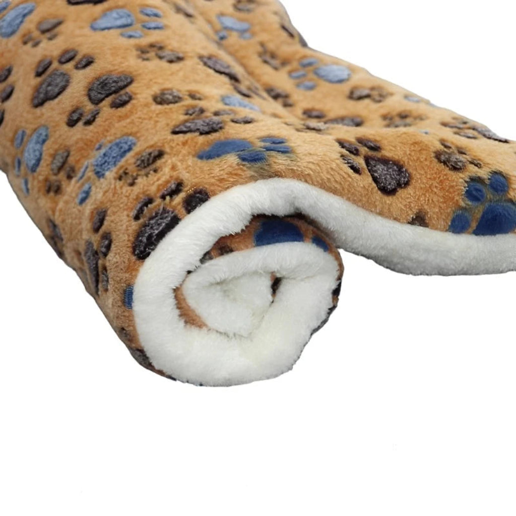 A roll of fabric with a leopard print pattern on a white background