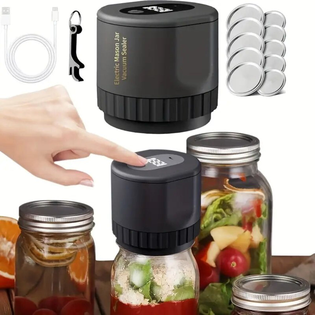 An electric mason jar vacuum sealer kit in black, including a sealer device and accessories for wide and regular mouth jars, with a person's finger pressing down on the sealer.