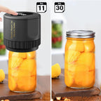 Electric Mason Jar Vacuum Sealer being used on a jar of peaches with dates May 11 and May 30 displayed.