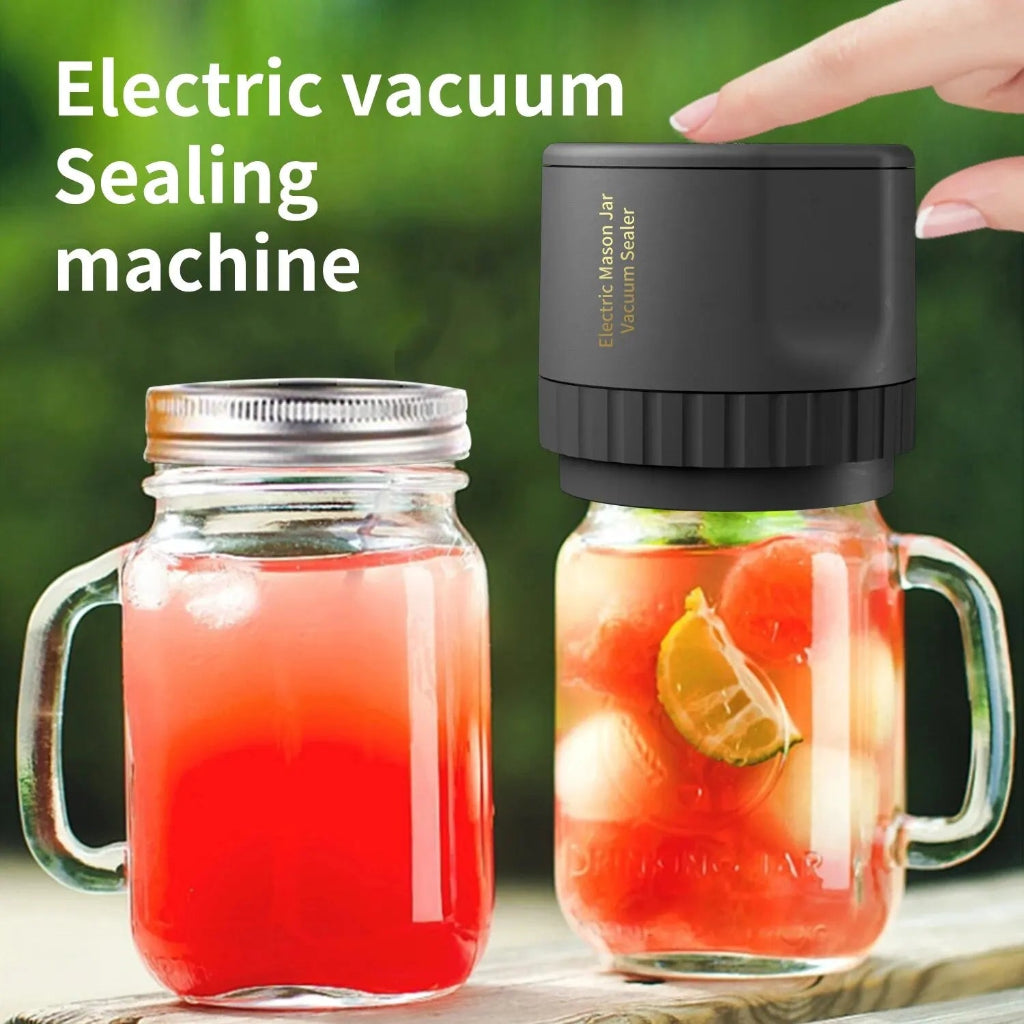 Electric vacuum sealing machine being used on a jar of juice with a hand holding it.