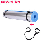 Rolling yoga mat with black straps and dimensions displayed on a white background