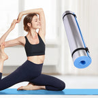 Woman practicing yoga with a yoga mat and mat holder in the foreground