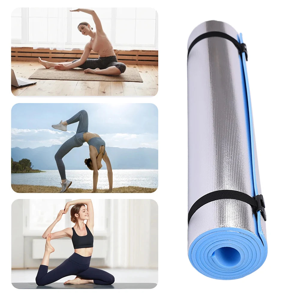 Yoga mat with images of people practicing yoga and a scenic background.