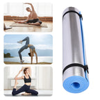 Yoga mat with images of people practicing yoga and a scenic background.