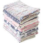 Stack of soft, patterned mat on a white background