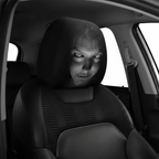 Close-up of horror skull face car headrest cover on seat