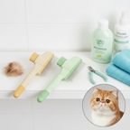 Grooming combs on shelf with cat nearby