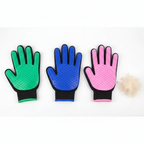 Pet grooming gloves flat lay with collected fur
